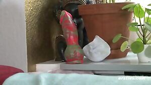 Ida plays with her interesting toy.