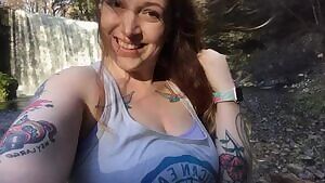 Big boobies by the waterfall
