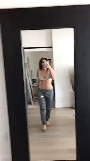 Lauren Giraldo in see-thru bra