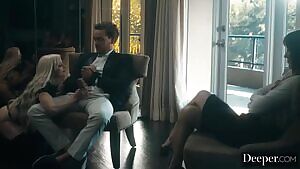 Sultry blonde sucks cock while mature babe watches