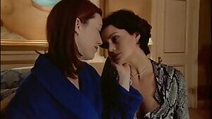 Molly Parker and Carla Gugino making out in The Center of the World