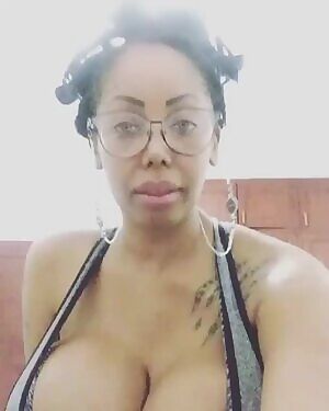 Arlen Afrodita flashing her amazing 5000cc+ tits.