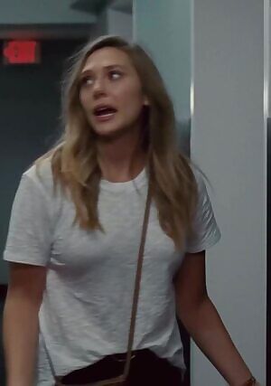 That shirt can't hide Elizabeth Olsen's fine tits