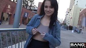 Taking her boobs out in front of the stadium